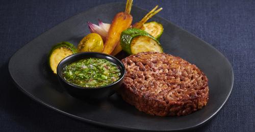 Roasted patty with chimichurri sauce